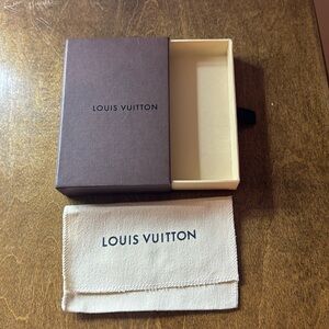New Louis Vuitton box with dust bag!! Approximately 5.5 inches by 3.5 inches